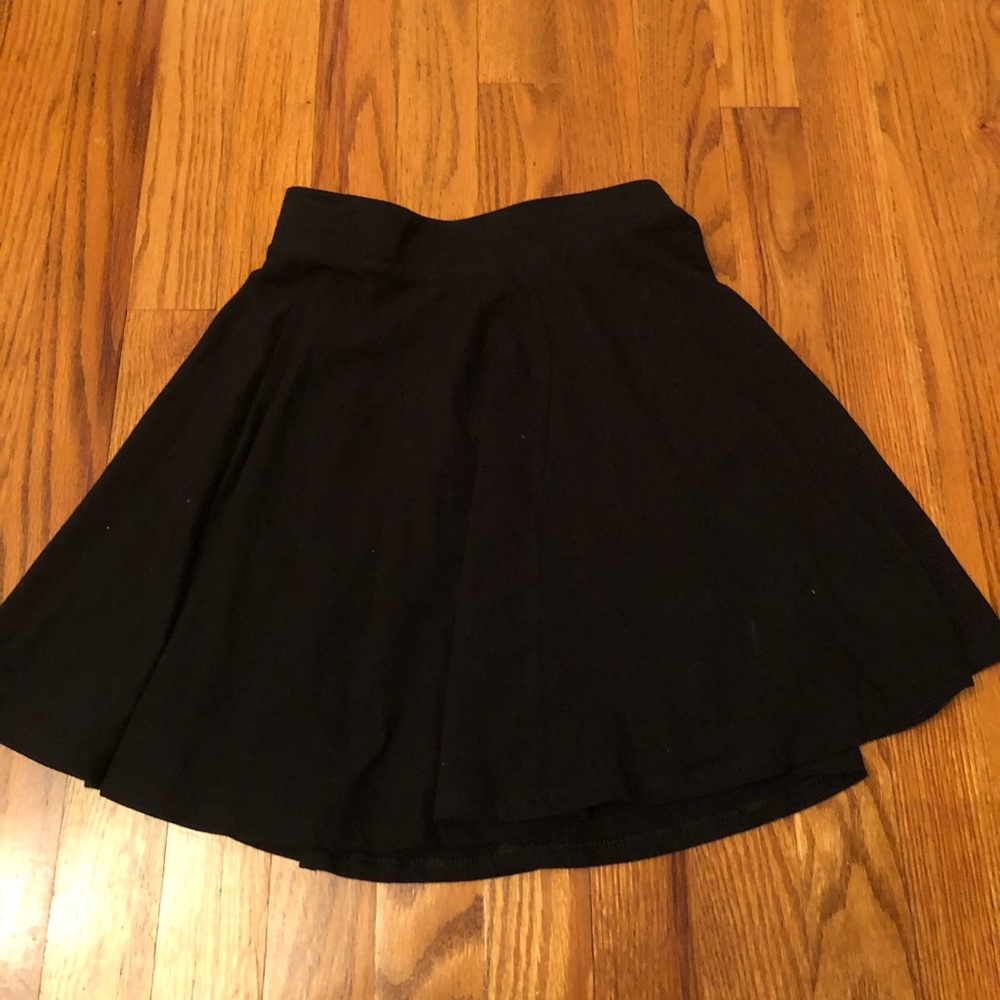 Short flowy black skirt
